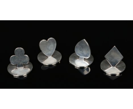 A set of four Edwardian silver menu holders by Charles &amp; George Asprey. Each representing one of the four playing card su