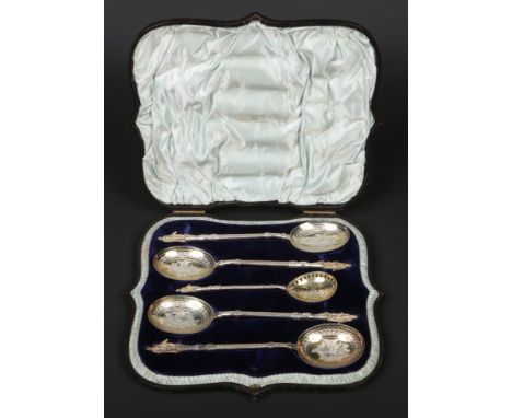 A Victorian cased set of four silver berry spoons and sifting spoon by Walker &amp; Hall. Engraved with flowers and each havi