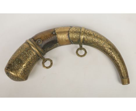 An 18th century brass mounted horn powder flask, 35cm.