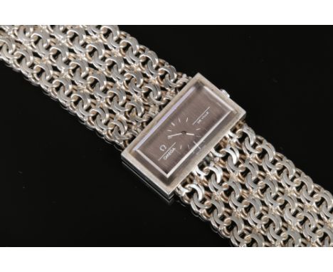 A ladies silver Omega De Ville Jeux D'Argent manual bracelet watch. With grey satin rectangular dial, beveled crystal and fou