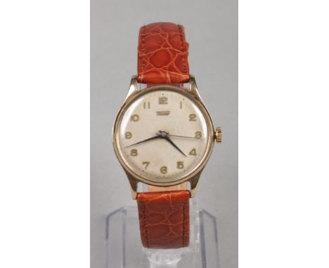 A gentleman's 9 carat gold cased Tissot manual wristwatch in case. With centre seconds and applied gold Arabic numeral marker