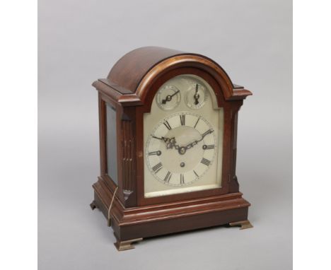 An early 20th century mahogany cased 8 day triple fusee bracket clock by Winterhalder &amp; Hofmeier. With silvered arch top 