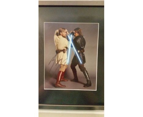 CINEMA, signed colour photo by Ewan McGregor, in light-saber pose from Star Wars with Matt Lanter (unsigned), 8 x 10, hurried