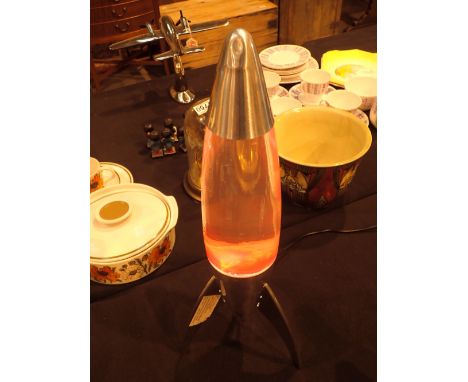 Rocket ship lava lamp  CONDITION REPORT: The electrical items included in this lot have been PAT tested and have PASSED. This