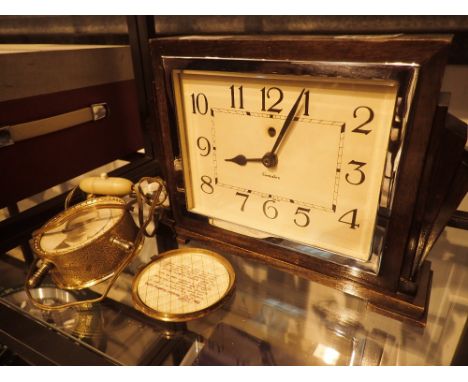 Art Deco mantel clock with quartz movement and an unusual brass table lamp A/F