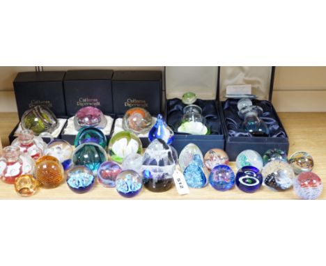 A collection of mostly Caithness glass paperweights, 1980s-2000s, with various boxes