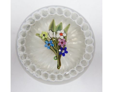 A Paul Ysart ‘small flower bouquet’ glass paperweight, Caithness or Harland period, ‘PY’ cane, white latticino ground, fire p