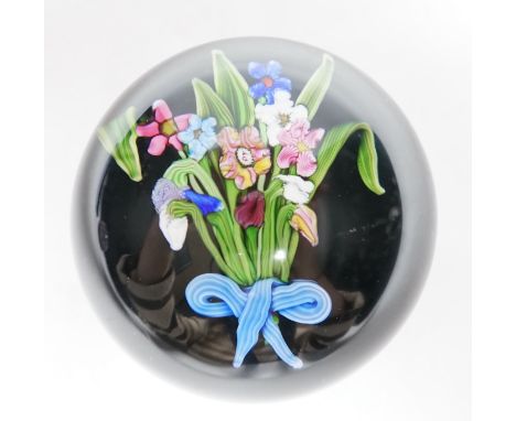 A Paul Ysart ‘small flower bouquet’ glass paperweight, pre-war Moncrieff period, ‘PY’ cane, the bouquet with a blue and white