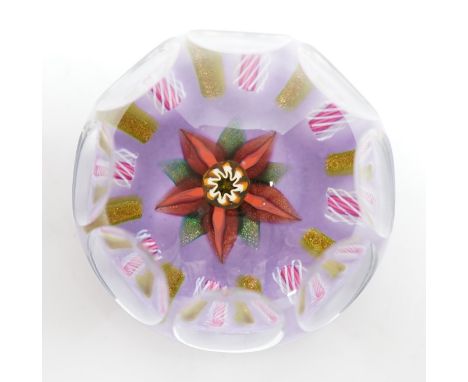 A Paul Ysart faceted ‘flower’ glass paperweight, Harland period, the central flower within aventurine and latticino spokes on