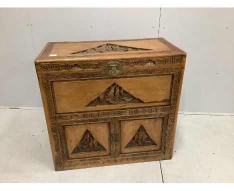 A Cantonese carved camphorwood trunk, width 91cm, depth 45cm, height 86cm