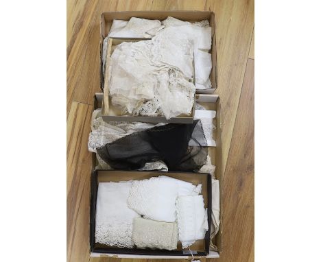 A collection of late 19th and 20th century bobbin lace, machine lace and embroidery anglaise trimmings, with a collection of 
