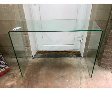 A Contemporary glass console table, width 99cm, depth 33cm, height 75cm