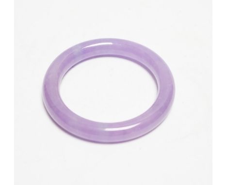 A Chinese lavender hardstone bangle