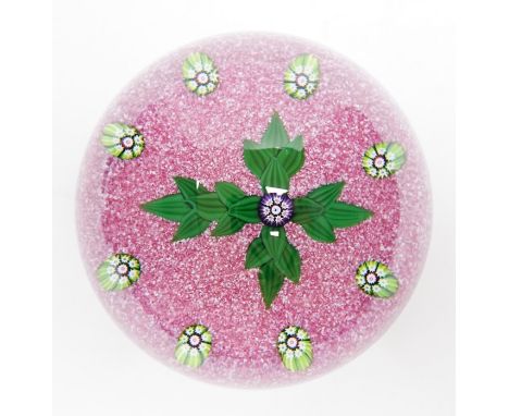 A Paul Ysart ‘leaf cross’ glass paperweight, Harland period, ‘H’ cane, pink jasper ground, polished concave base, paper label
