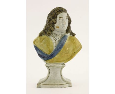 A Ralph Wood pearlware Bust of Handel,c.1780, wearing a long wig, yellow cloak with blue lining,21.5cm highProvenance:	Mr and