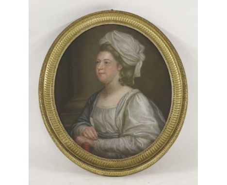 James Scouler (1740-1787)PORTRAIT OF A LADY, HALF LENGTH, HOLDING A QUILLSigned and dated 1780 l.l., pastel, oval54 x 44cm, i