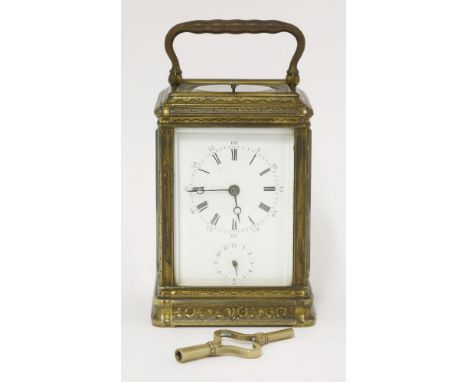 A brass repeat alarm carriage clock,late 19th century, by Dracourt & Co., the enamel dial with Roman and Arabic numerals and 