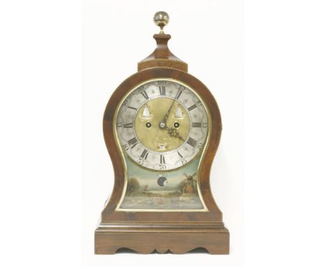 A mahogany bracket clock,having a gilt knop finial, the silvered dial with Roman and Arabic numerals, inscribed for Thomas Be