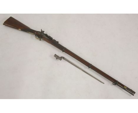 A Snider Enfield .577 rifle,the plate marked '1860, LA Co.', V R crowned with brass mounted stock and trigger ground, ramrod,