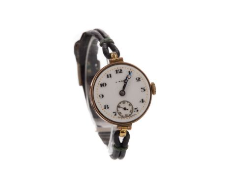 LADY'S TAVANNES NINE CARAT GOLD CASED MANUAL WIND WRIST WATCH, the round white dial with Arabic hour markers, dot outer secon