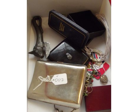 Box to include a cigarette case and a vintage bottle opener 