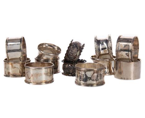 COLLECTION OF TWELVE SILVER NAPKIN RINGS,various dates and makers, approx 340gCondition report: Each without damages, though 