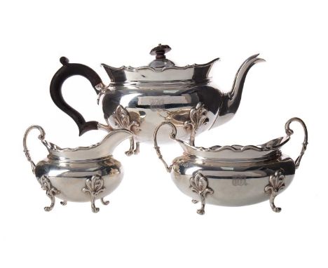 GEORGE V SILVER THREE PIECE TEA SERVICE,maker George Edward &amp; Sons, London 1917, comprising teapot, sugar bowl and cream 