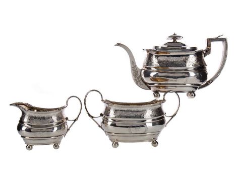 GEORGE III SILVER TEA SERVICE,maker George Fenwick, Edinburgh 1810, comprising teapot, sugar bowl and cream jug, each of shap