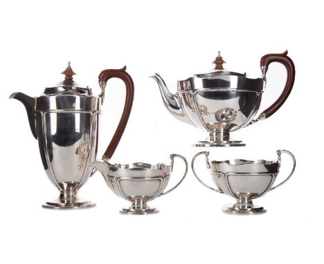 GEORGE V SILVER FOUR PIECE TEA SERVICE,maker Adie Bros. Ltd, Birmingham 1927, of Art Nouveau design, teapot 26cm long, approx