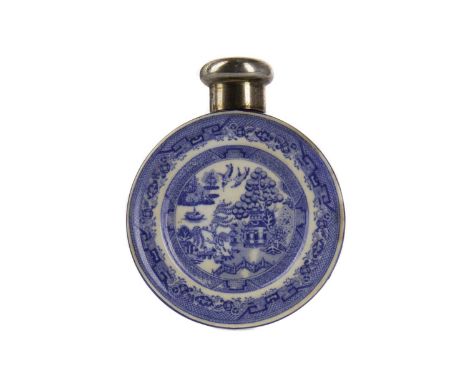 VICTORIAN SILVER TOPPED PERFUME BOTTLE,maker Sampson Mordan, London 1885, the flattened circular bottle transfer printed in b