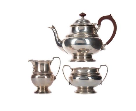 GEORGE V SILVER THREE PIECE TEA SERVICE,maker Adie Brothers &amp; Co., Birmingham 1933, comprising teapot, sugar bowl and cre