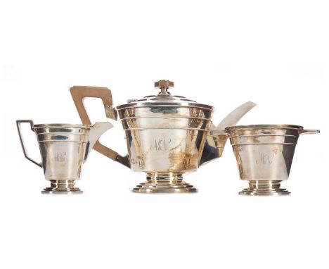 GEORGE VI SILVER THREE PIECE TEA SERVICE OF ART DECO DESIGN,maker Walker &amp; Hall, Sheffield 1939, comprising teapot, cream