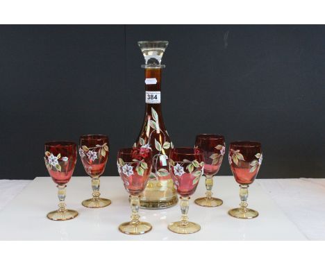 Ruby flash overlay and iridescent glass Decanter and six drinking glasses with Enamel Floral decoration