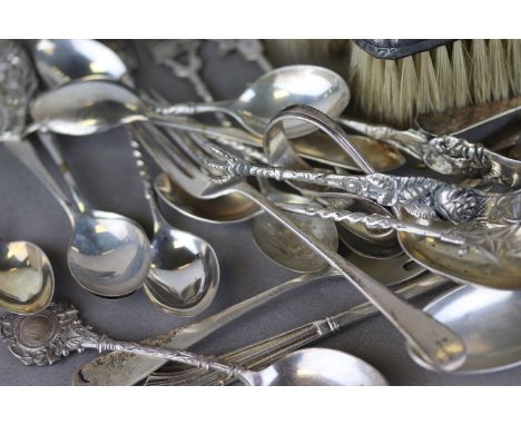 Silver handled three piece dressing table brush set, makers W I Broadway & Co, Birmingham 1922, an elongated octagonal silver