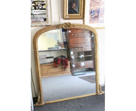 Large 19th century Style Gilt Framed Overmantle Mirror with bow finial and scroll and leaf border, 144cms high