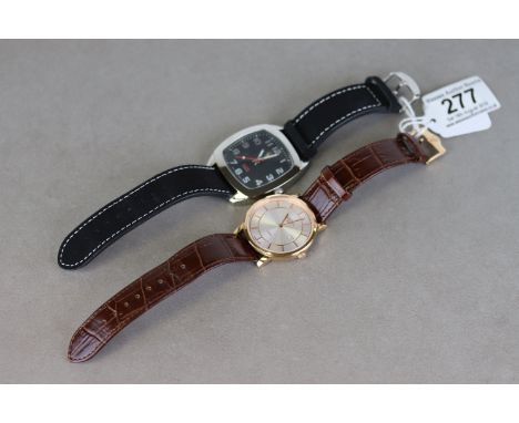 A Gents Roamer Classic wristwatch, silvered dial, rose metal baton numerals and pencil hands together with a Swiss Emporio Ge