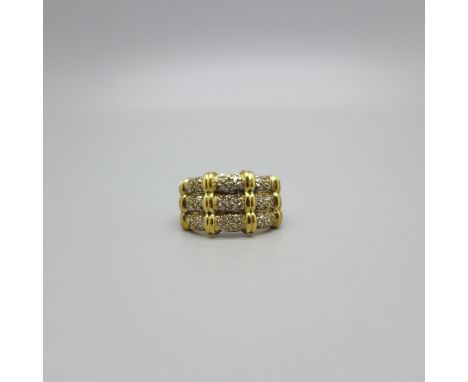 A 9ct gold and thirty-six diamond ring, 3.2g, L 