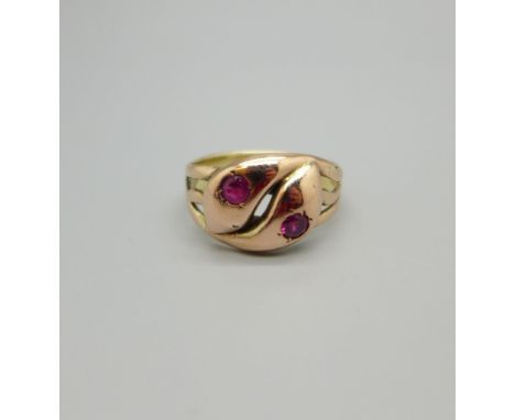 A 9ct gold snake ring with ruby eyes, 5.9g, U 