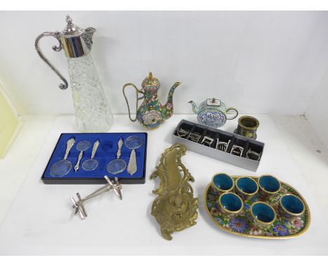 A small cloisonné enamel coffee service, a small enamel teapot, an Art Nouveau style inkwell and pen holder, a claret jug, a 