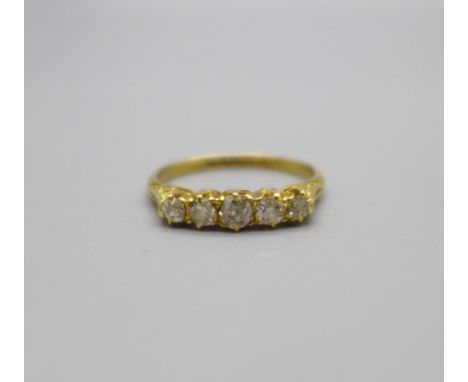 An 18ct gold and five stone diamond ring, London 1916, 2.4g, P 