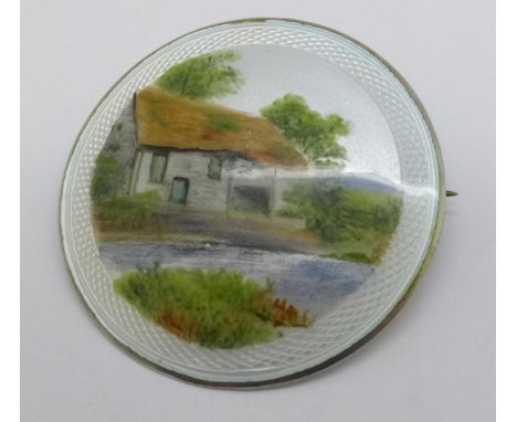 A silver and enamel brooch, Birmingham 1947, maker QP 