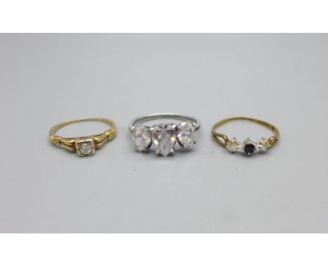 A 14ct gold and diamond ring, 1.3g, L, a 9ct gold, white and black stone ring, 0.6g, M, and a silver ring, P 