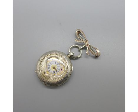A lady's 935 silver fob watch with heart shaped enamel dial, with hanging bow brooch and key 