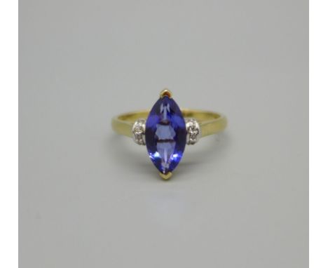 A 14k gold ring set with a 0.81ct marquise tanzanite and eight diamonds, 2.6g, N 