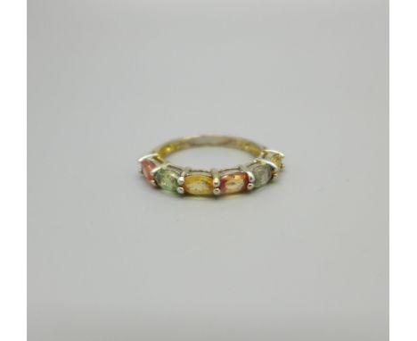 A silver gilt, multi-colour sapphire ring with certificate 