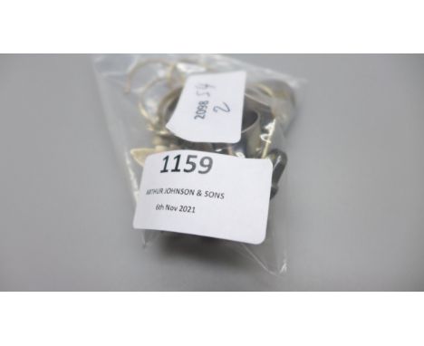 A collection of silver jewellery including necklaces, bracelets, rings, etc., and a stainless steel ring 