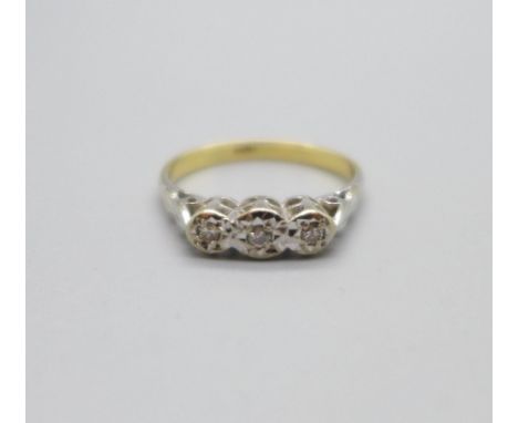 An 18ct gold, platinum set diamond trilogy ring, 2.7g, N 