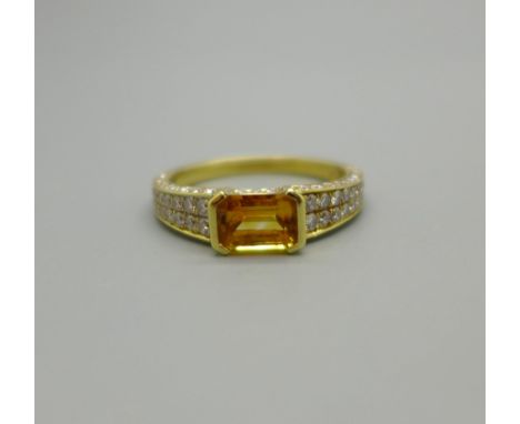 An 18ct gold, citrine and diamond dress ring, set with 100 diamonds, 4.1g, P 