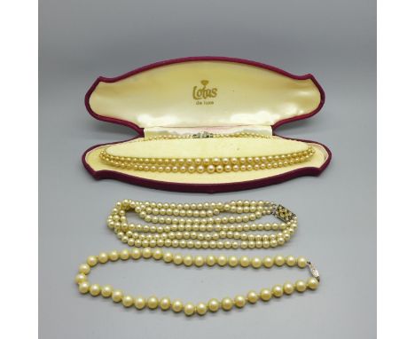 Three silver mounted pearl necklaces 