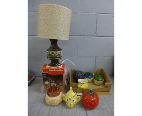 A collection of kitchen items including a pestle and mortar, coffee maker, brass weights, sealed Harrods teabags in pot and a